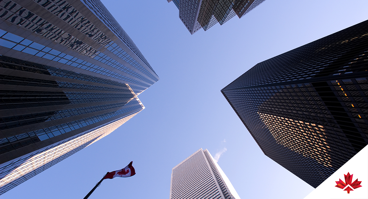 skyscrapers with flag of canada