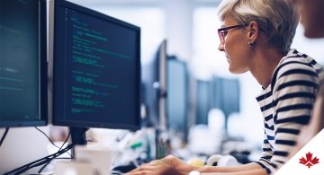 Woman Coding on Computer