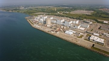 Aerial view of Darlington Nuclear Generating Station on shore of Lake Ontario in Clarington, Ontario, Canada.