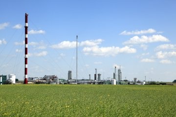 Natural Gas Plant and agricultural crop side by side.